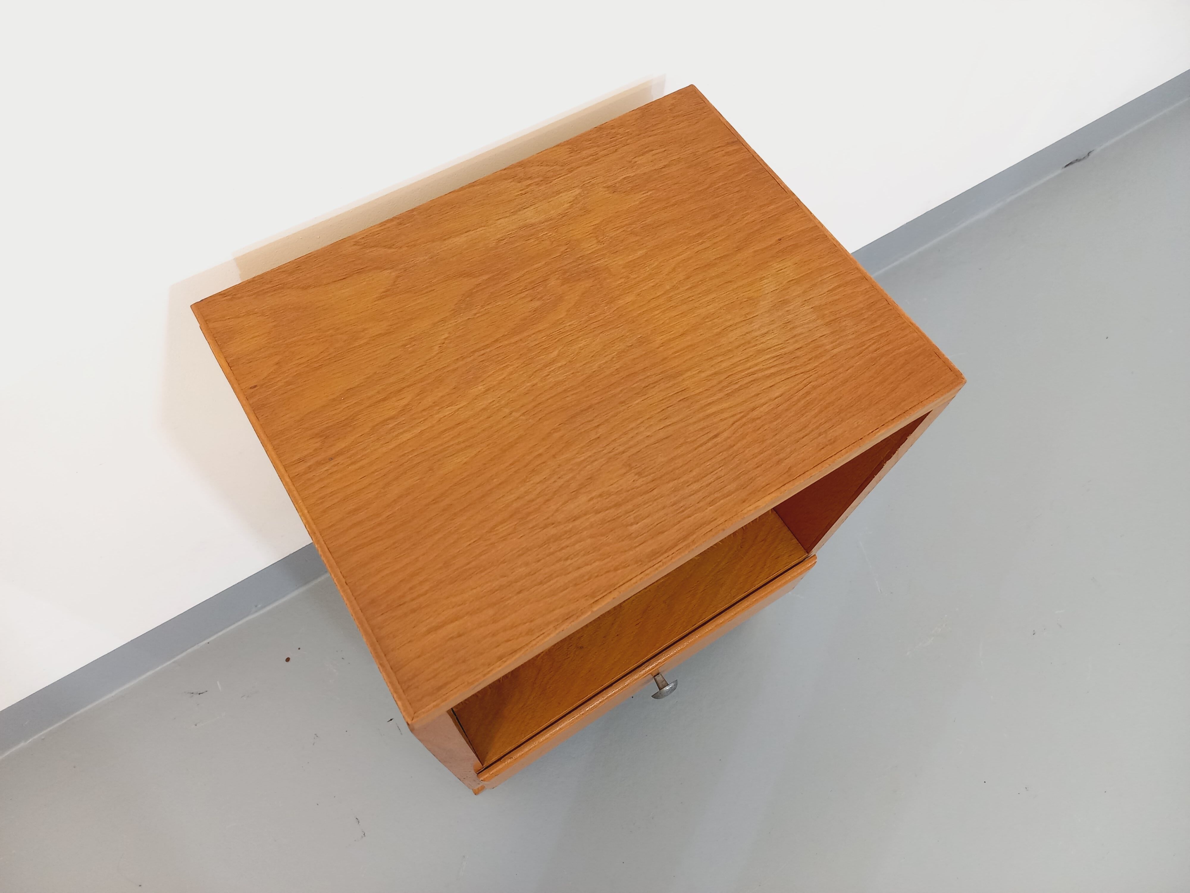 Vintage light wood bedside table from the 40s 50s