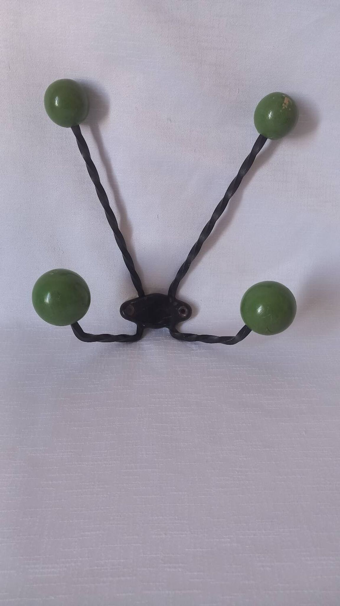 Vintage metal and wooden ball coat rack