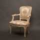 Paire de fauteuils de style Louis XV – Bois sculpté, doré et tissu brocart