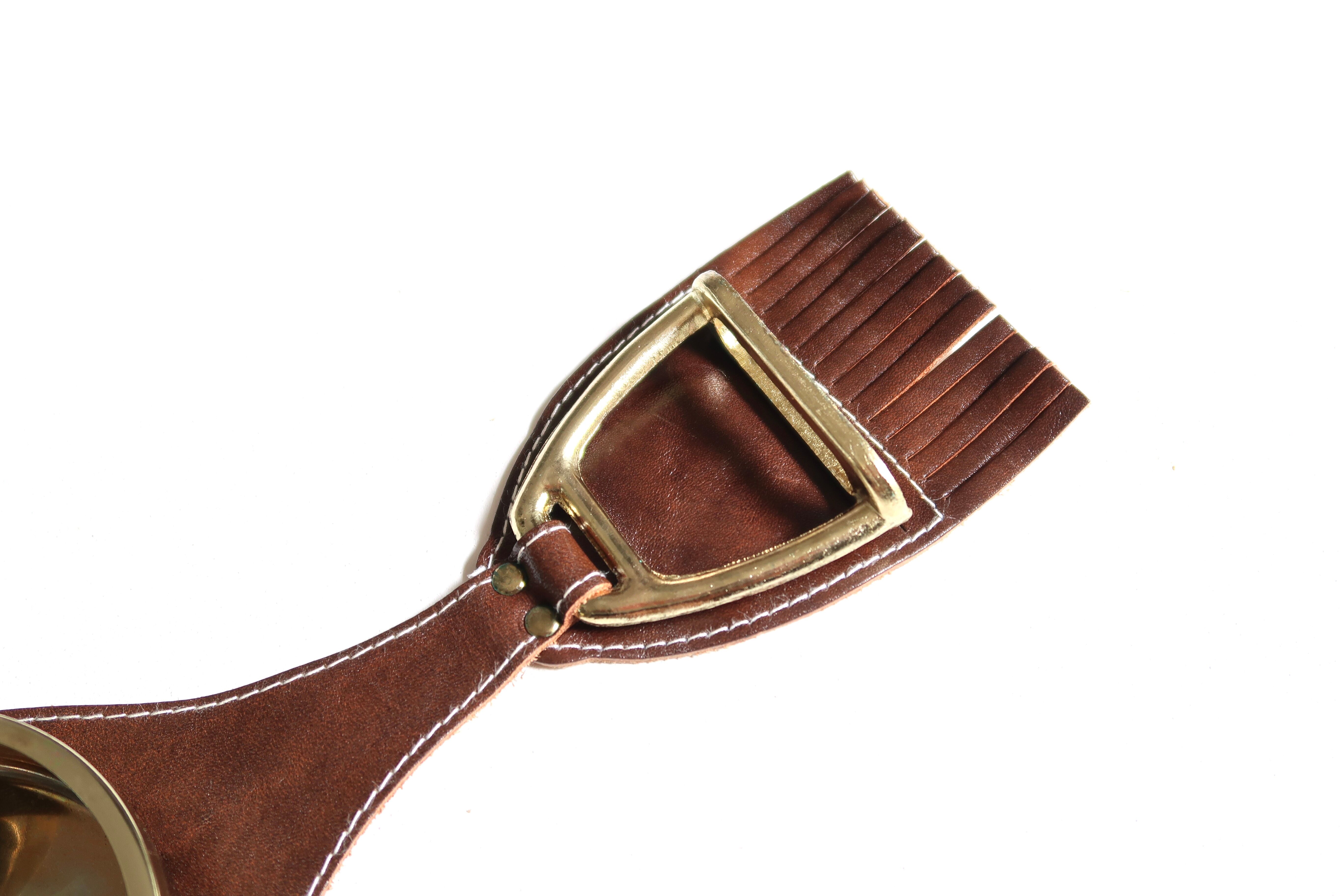 Armrest ashtray with stirrups, 50s