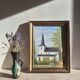 Oil on isorel depicting a church from Northern Europe.