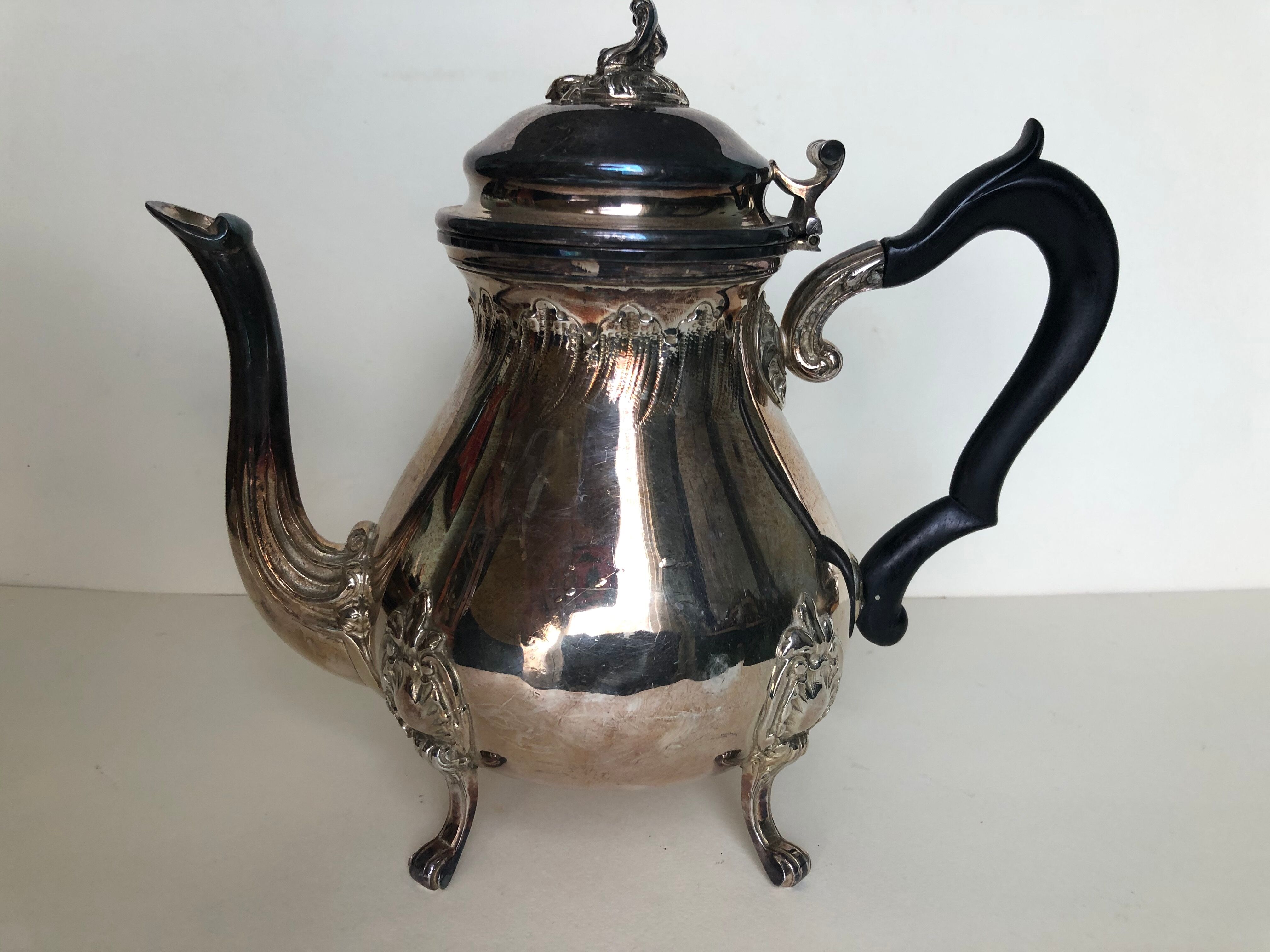 Tea service and silver metal coffee
