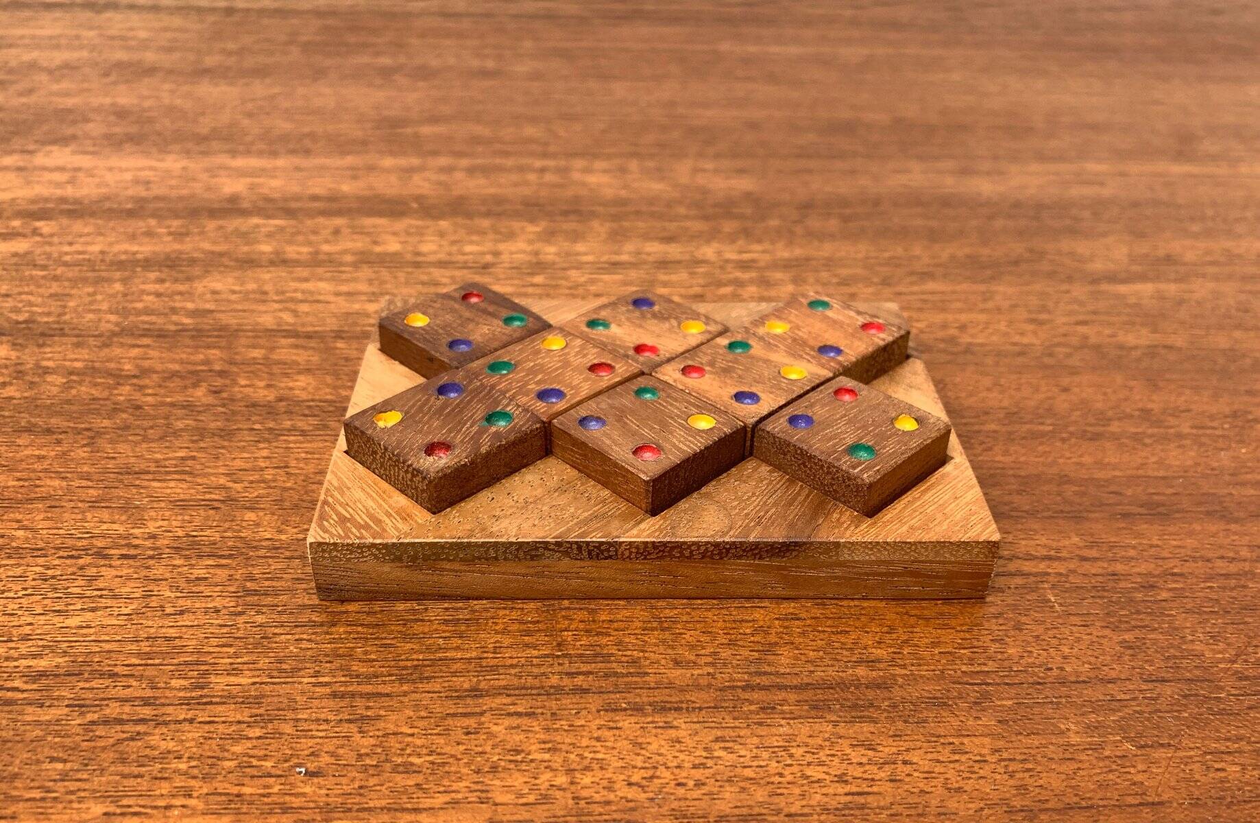 Mid-century Scandinavian teak dice game from the 1960s.