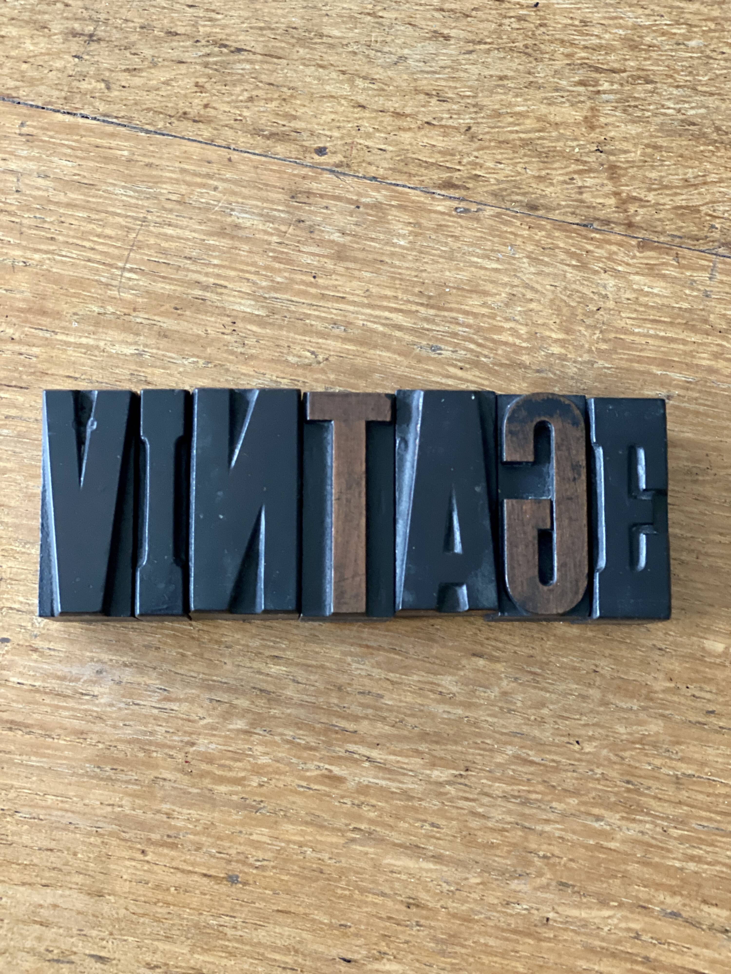 Old wooden printing letter