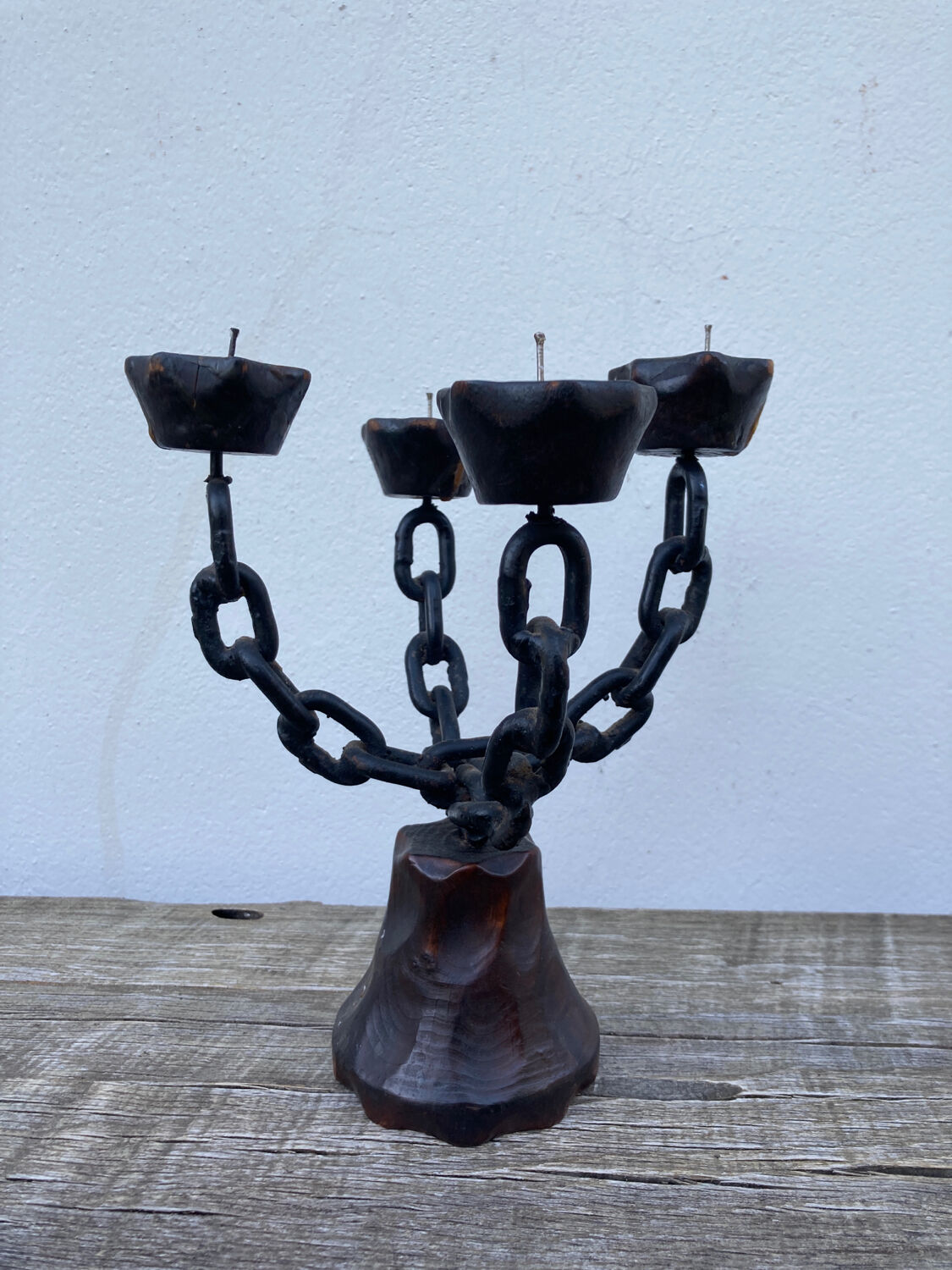 Brutalist iron and wood chain candle holder from the 1970s