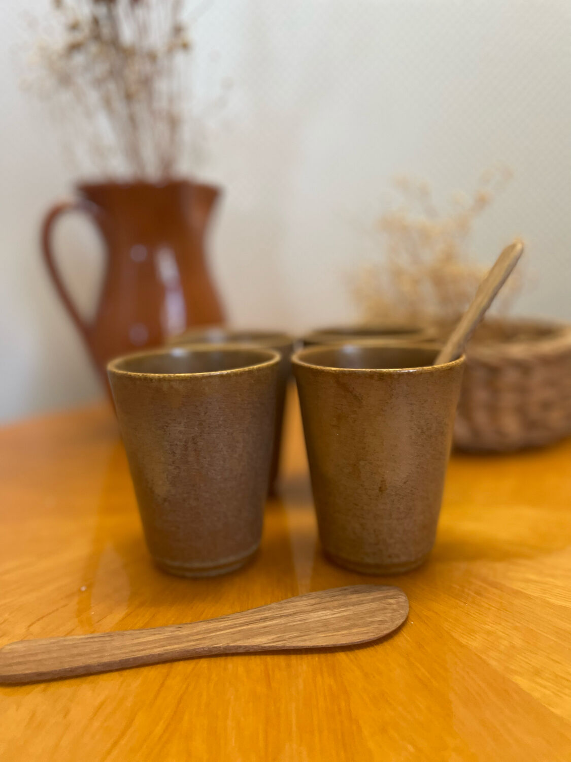 Set of 4 Digoin stoneware cups, glasses and wooden spoons