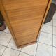 1950s oak office storage cabinet with curtains.