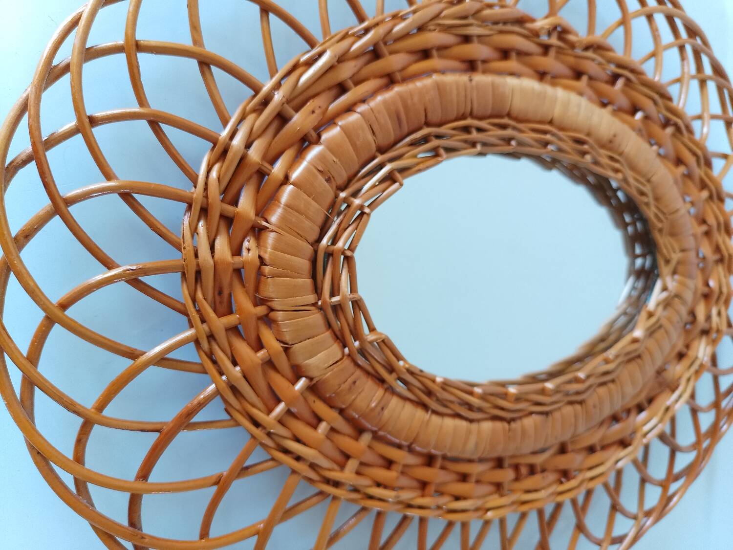 Woven rattan mirror