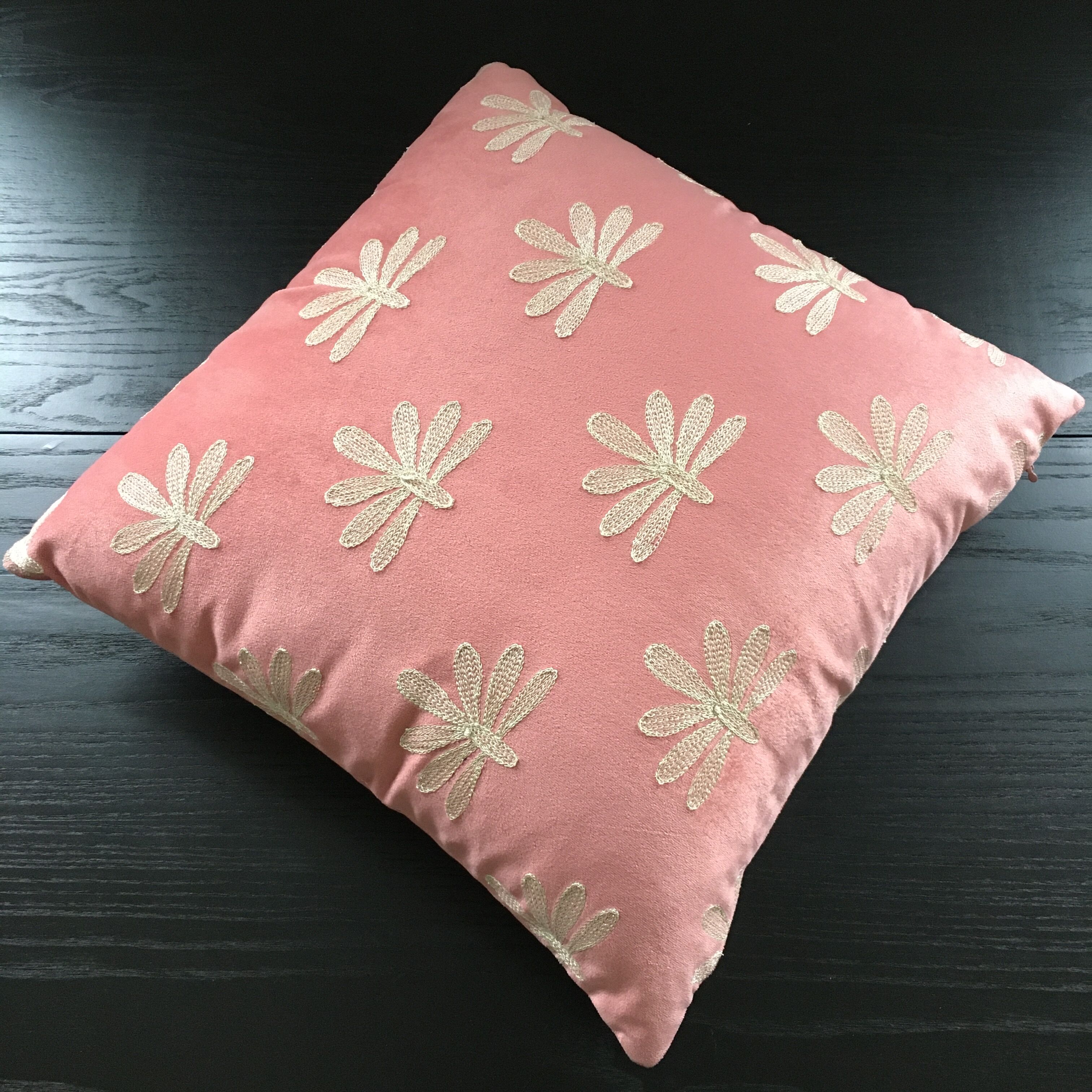 Pink cushion embroidered palm trees