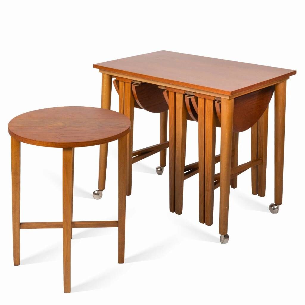 Table and four chairs set by Paul Hundevad