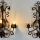 Wrought iron wall lights (pair) with foliage decoration