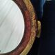 Miroir art déco ovale doré