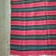 Hand-woven red wool rug