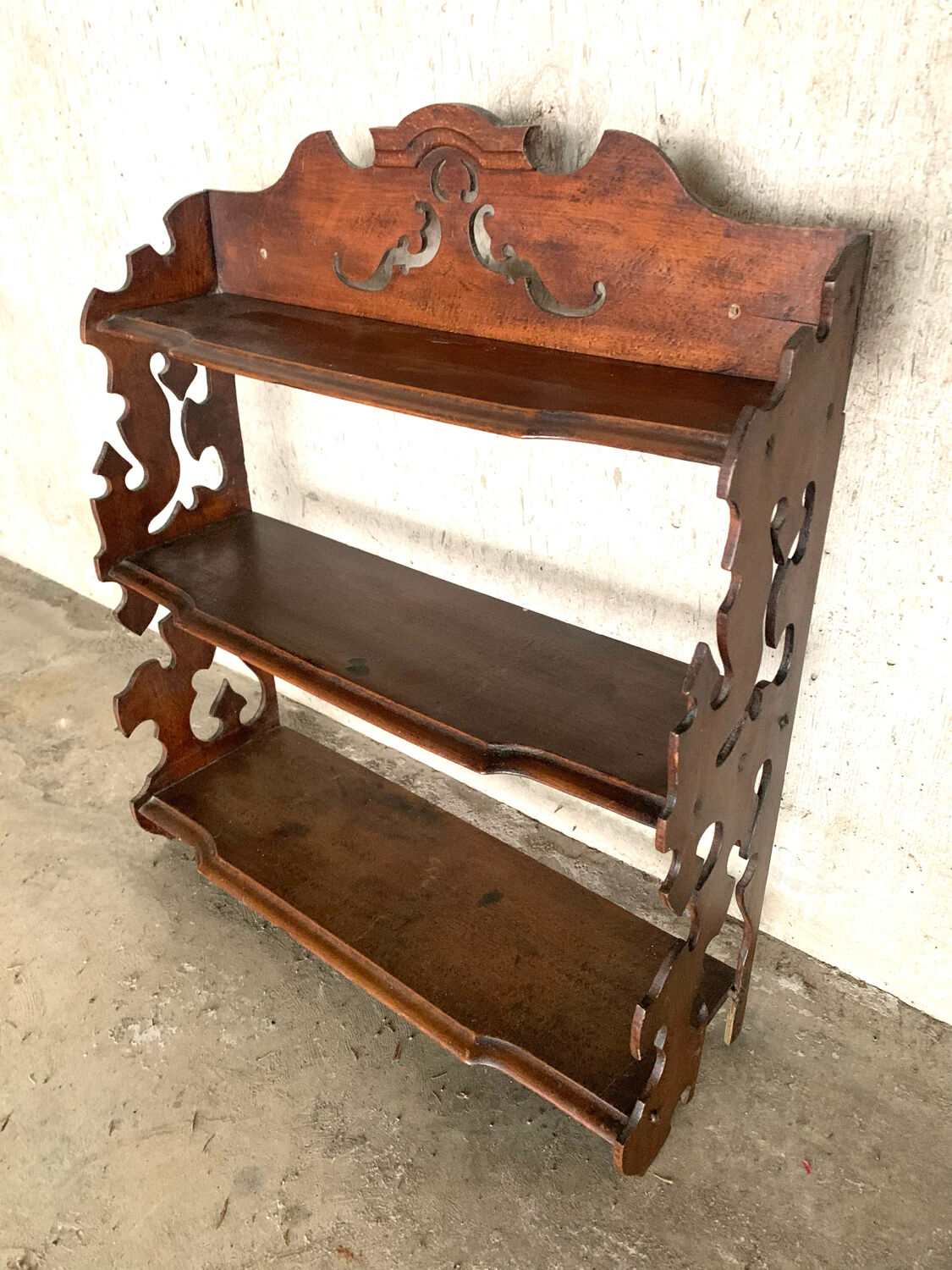 Carved wooden shelf
