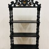 Blackened wooden shelf.