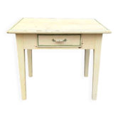 Rectangular coffee table in distressed yellow and green.