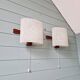 Pair of Scandinavian wall sconces in teak and plastic resin, 1960.