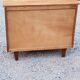 Vintage chest of drawers in golden oak from the 50s with 3 drawers and spindle-legged shelf
