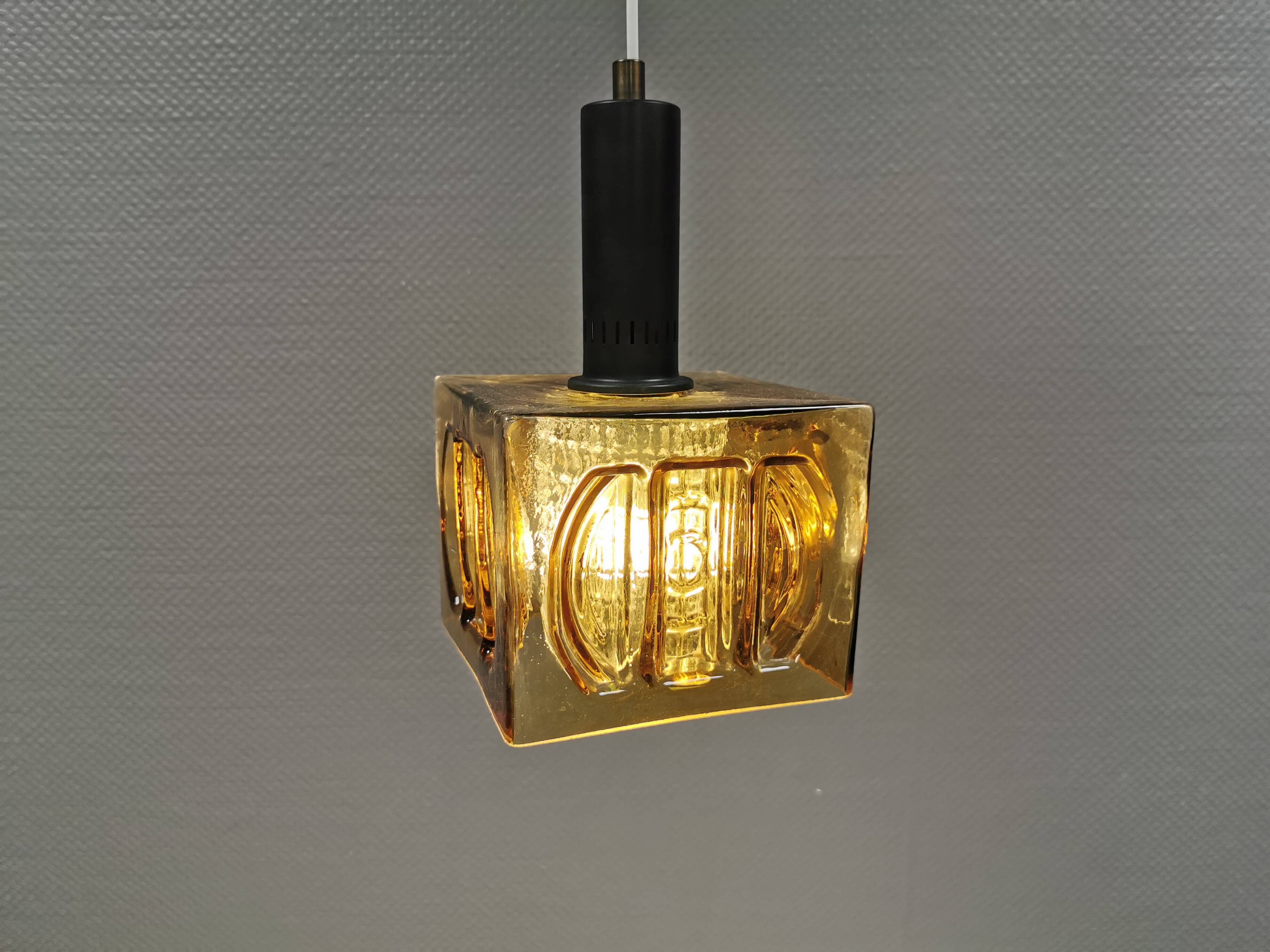 Older square hanging lamp with olive colored outer glass with inner shade of crystal glass