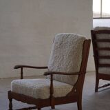 Modern Danish design, a pair of high-backed armchairs in oak and lambswool, 1950s.