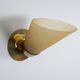 Set of three brass sconces with decorated yellow glass shades