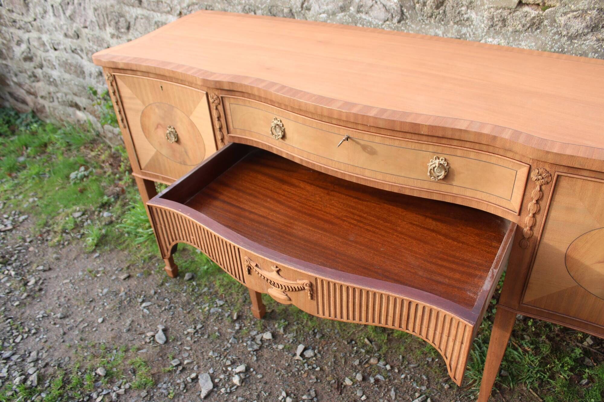 English-made enfilade in Louis XVI style with light wood veneers.