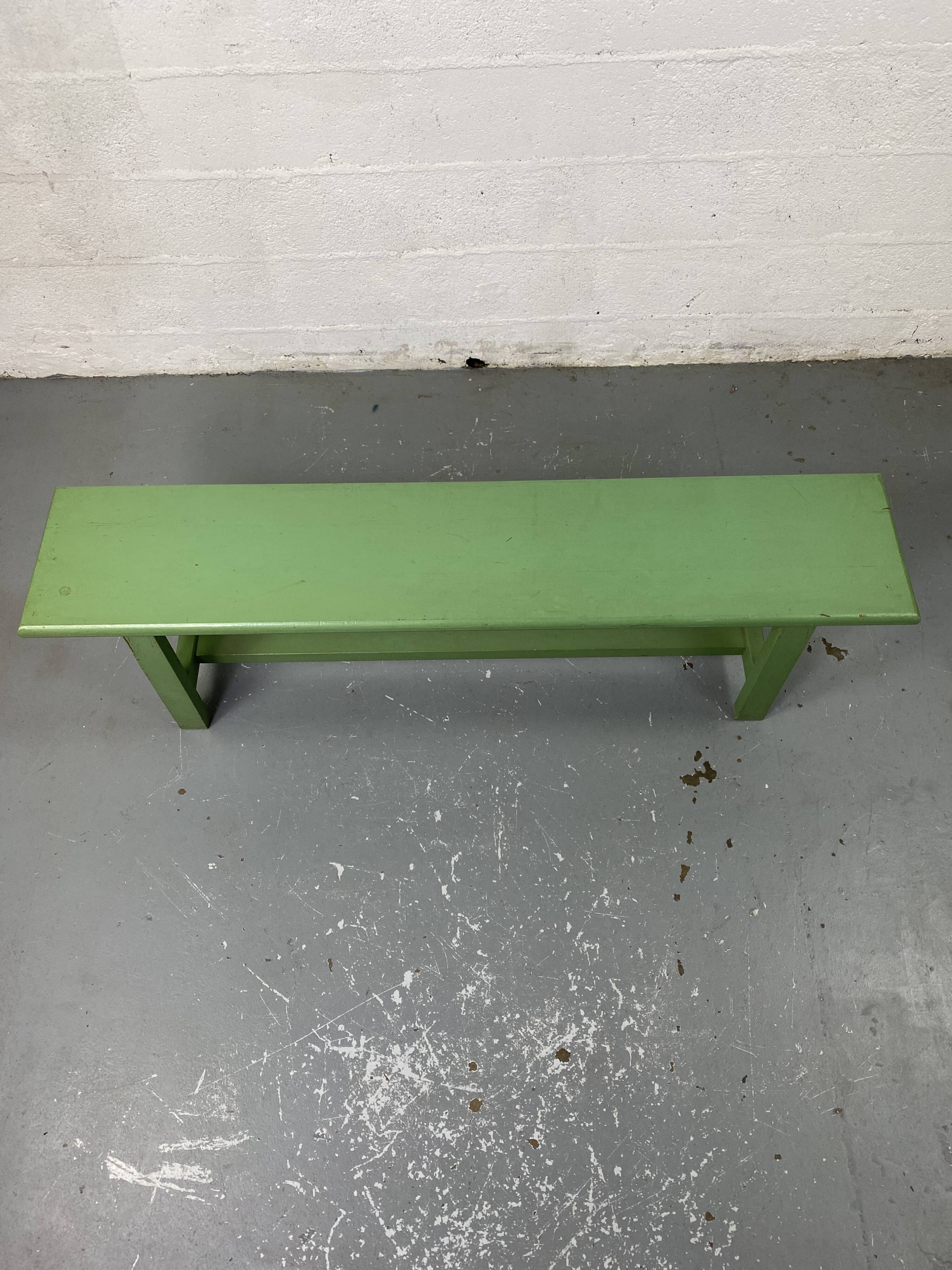 Green wooden bench