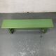 Green wooden bench