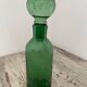 Old cracked glass carafe