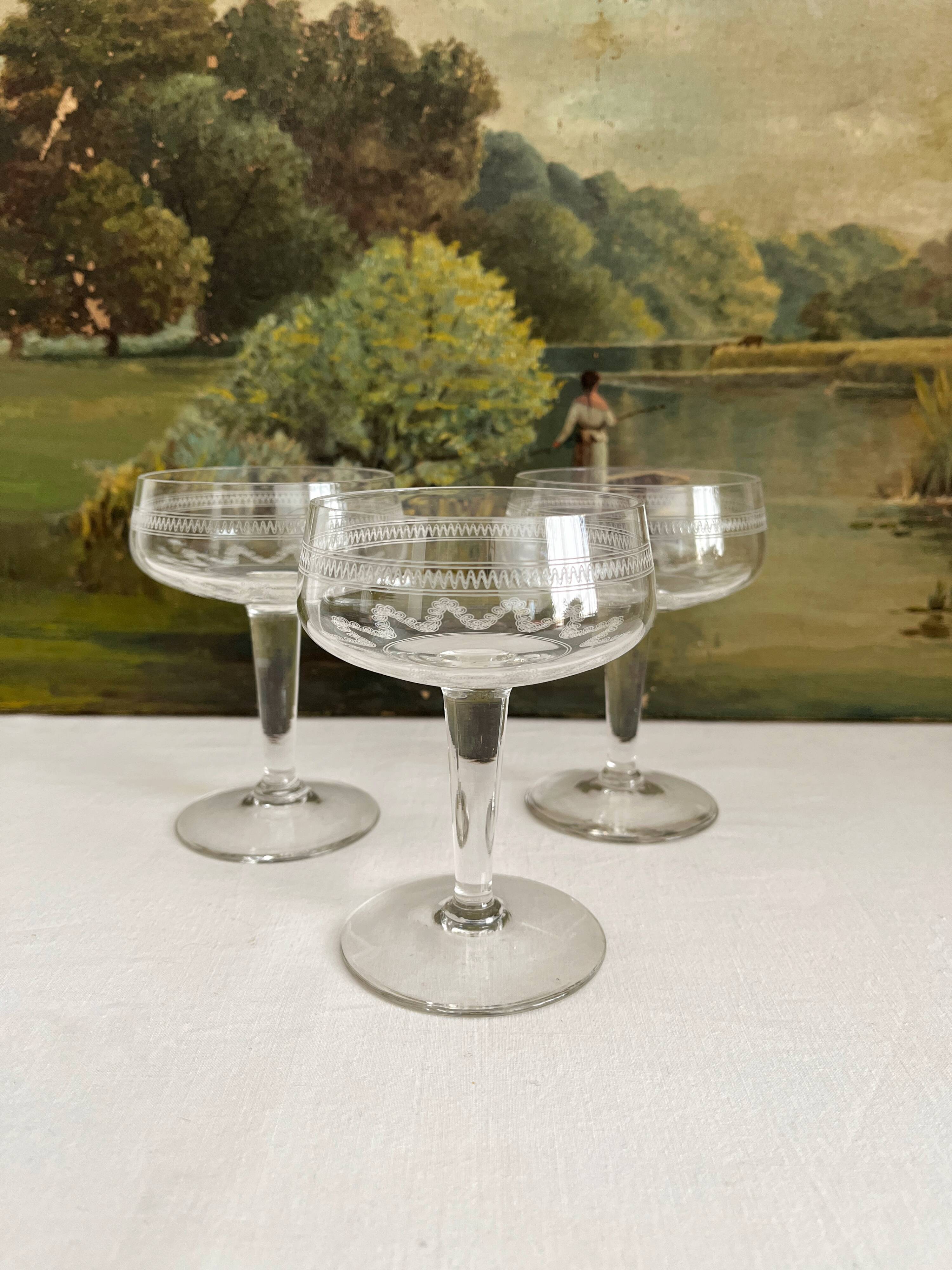 3 antique crystal champagne coupes with engraved decoration