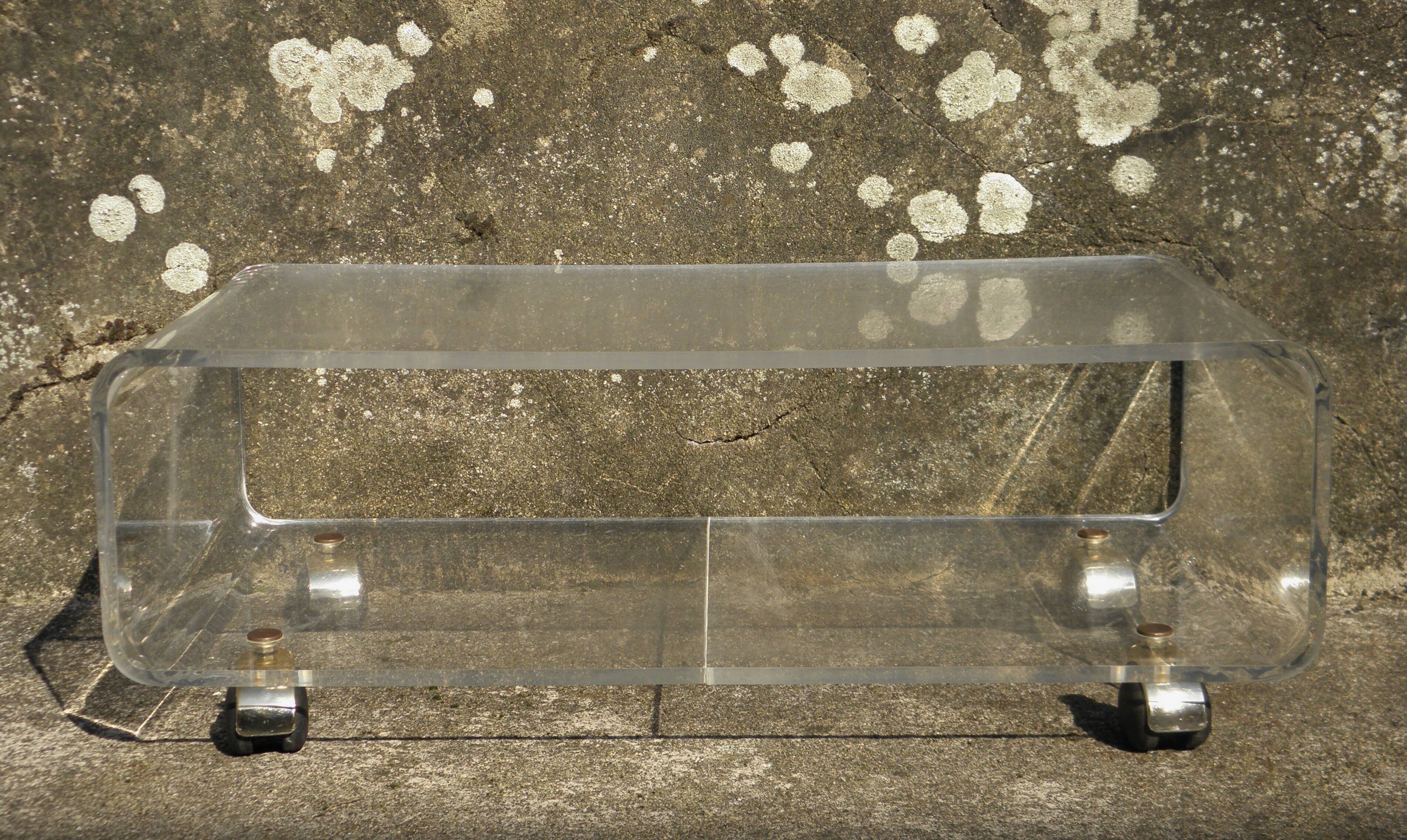 Plexiglass coffee table on wheels