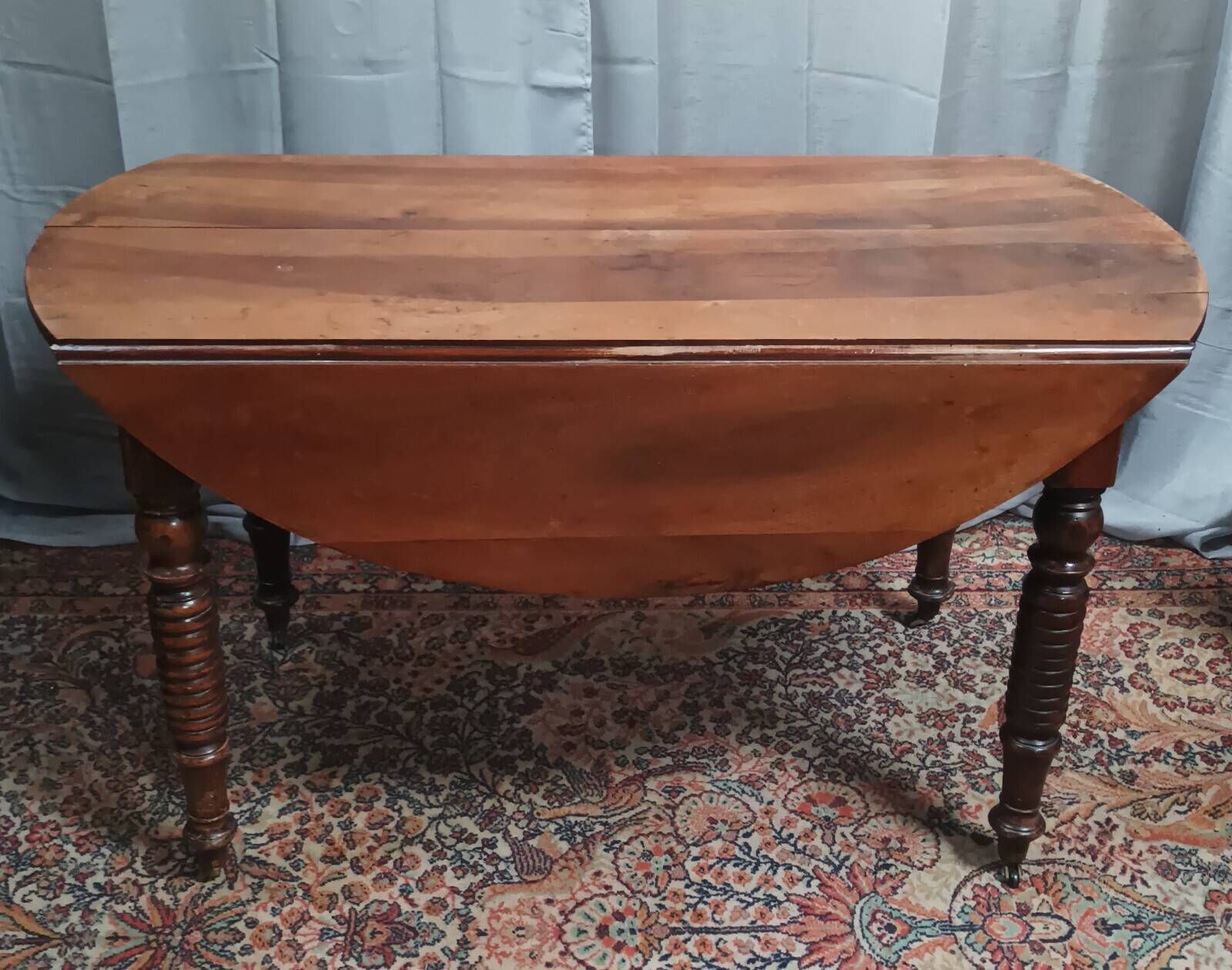 19th-century Louis Philippe walnut drop-leaf table.