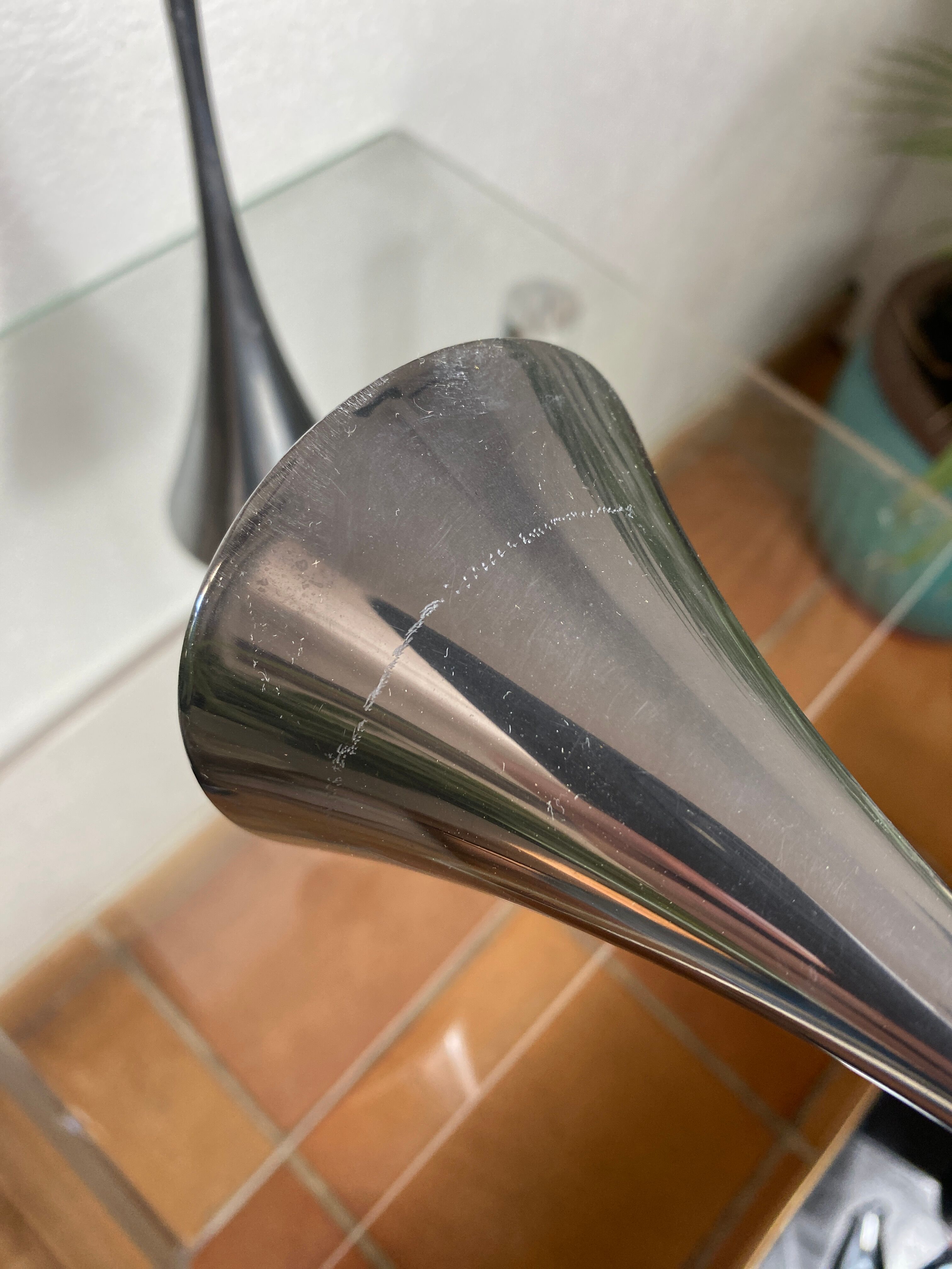 Pair of designer candle holders in stainless steel