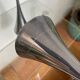 Pair of designer candle holders in stainless steel