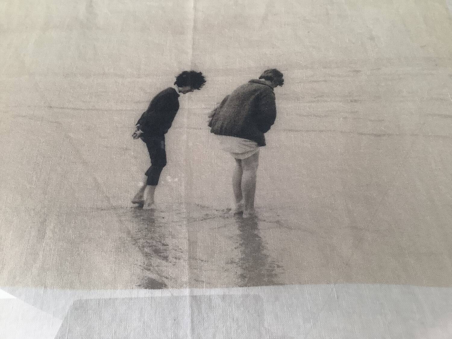Black and white photo on fabric, framed