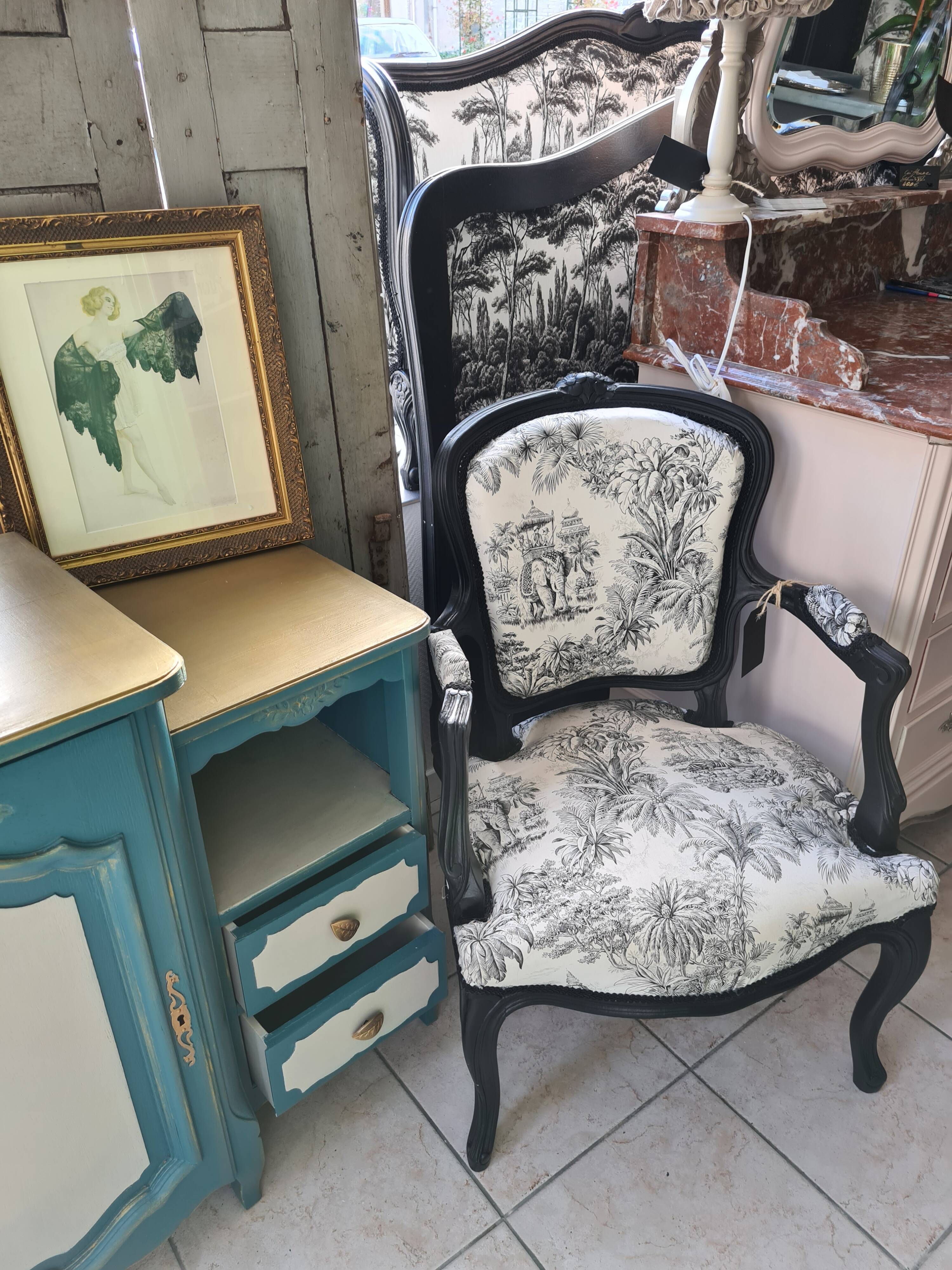 Armchairs Louis XV black woodwork lined with junggle fabrics