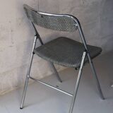 Vintage folding chair in chrome metal and chevron fabric.