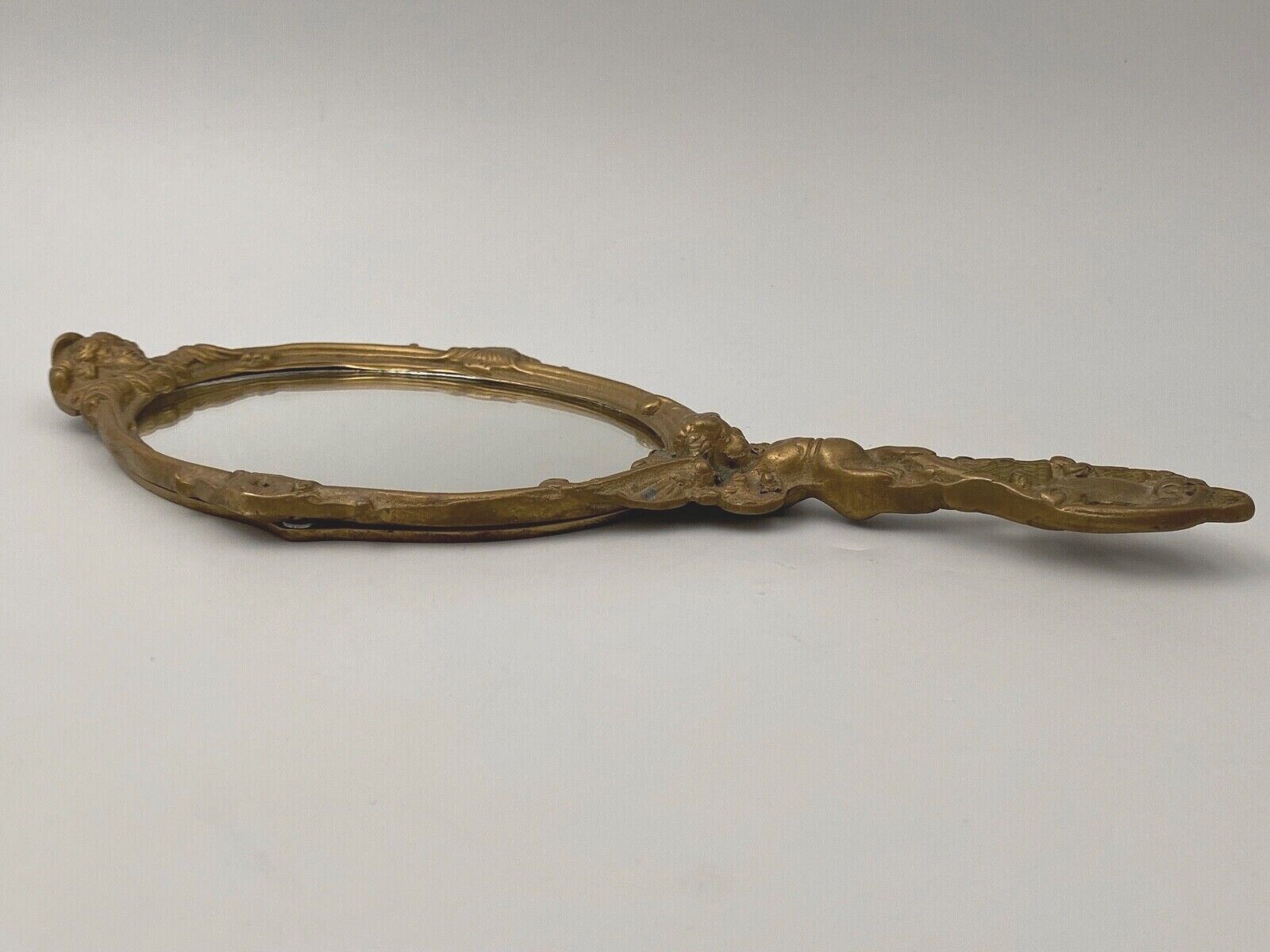 Bronze hand face of the middle XXe decor d'angelot