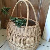 Round basket Wicker braided with two handles.