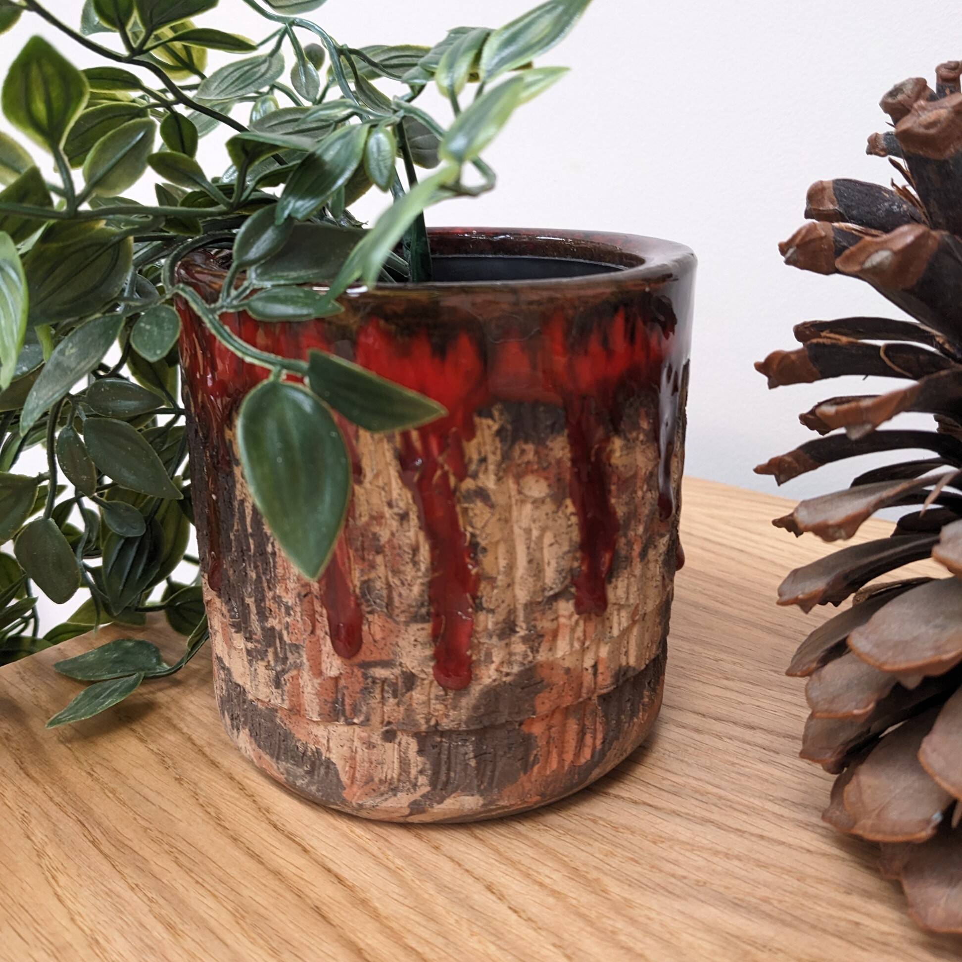 Brown and red ceramic pot