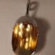 Sugar and sugar shovel in golden silver metal
