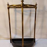 Victorian style half-moon umbrella stand in brass and cast iron