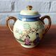 Vintage Japanese fine porcelain tea set with landscape pattern.