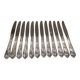 12 silver-plated dessert knives by St Medard, rocaille style, Florian.