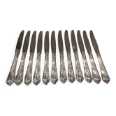 12 silver-plated dessert knives by St Medard, rocaille style, Florian.