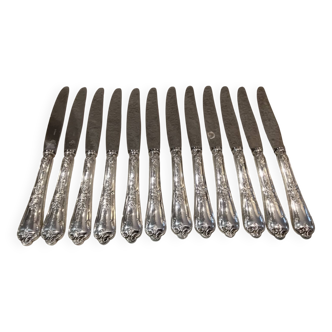 12 silver-plated dessert knives by St Medard, rocaille style, Florian.