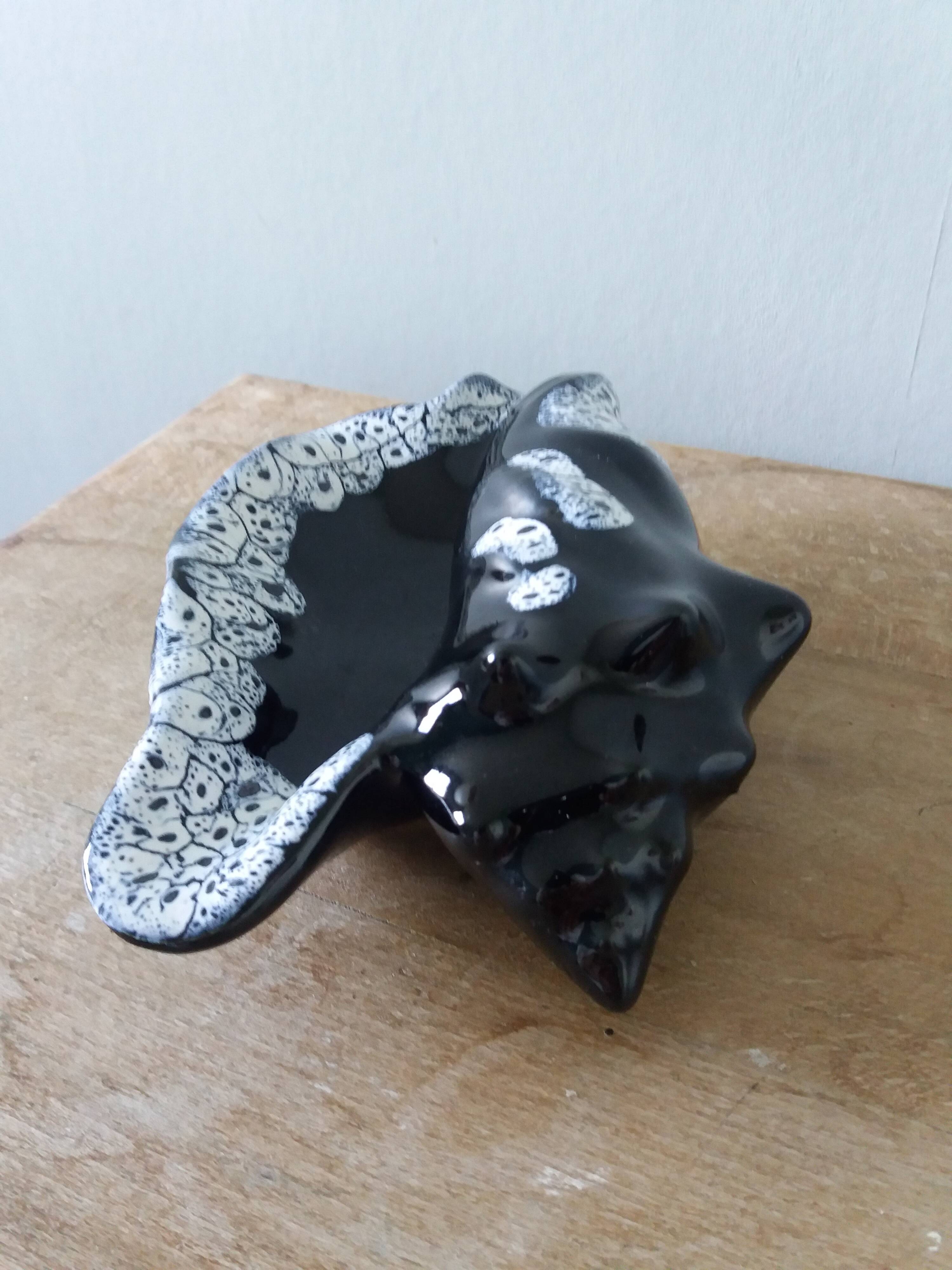 Black ceramic and foam shell ashtray