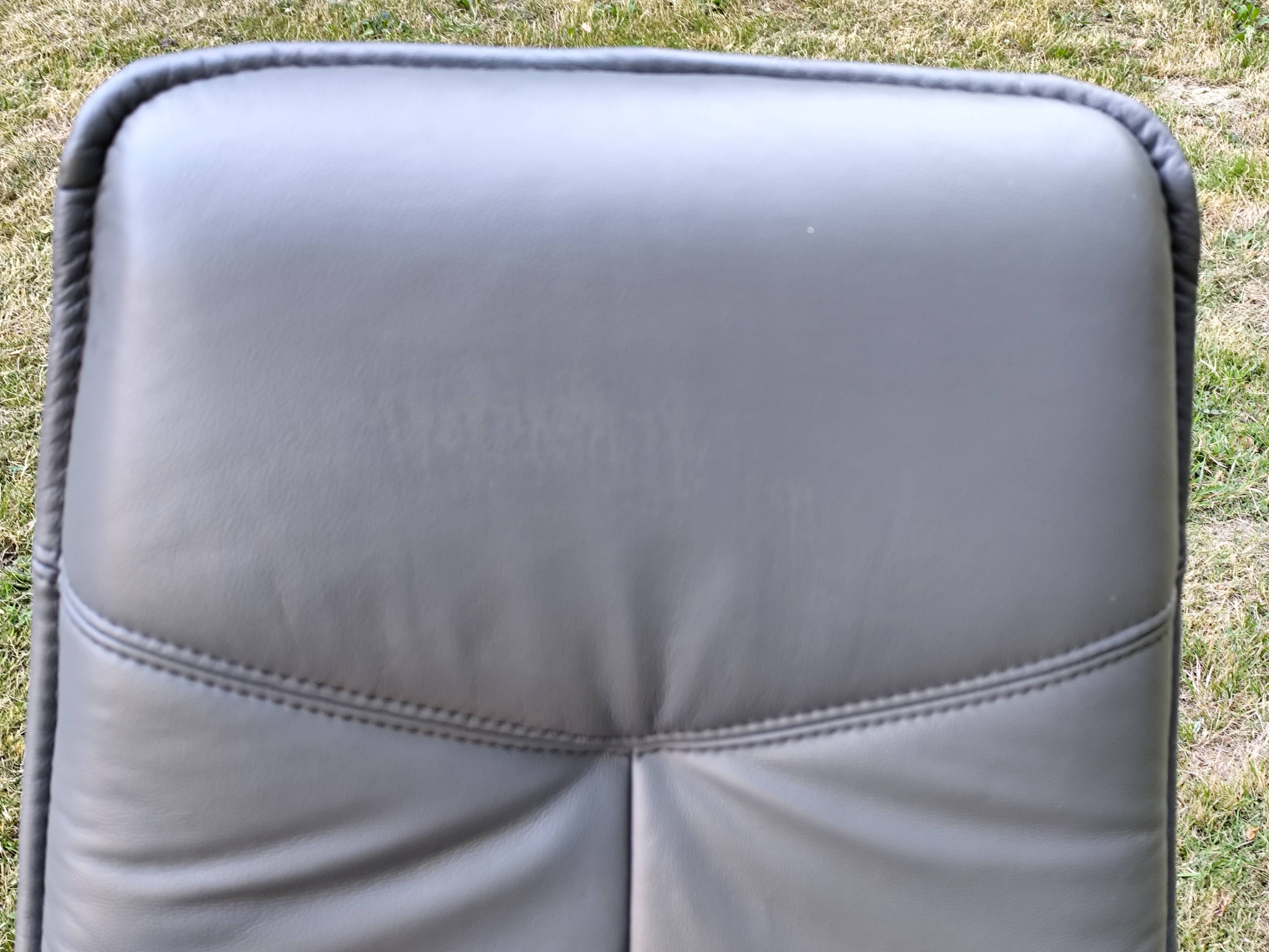 Stressless City armchair with footrest/ottoman, grey