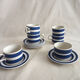 Series of 6 coffee cups in faience with blue stripes with saucers