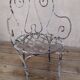 19th-century garden armchair in wrought iron